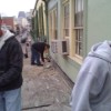 Guys painting front of Vieux